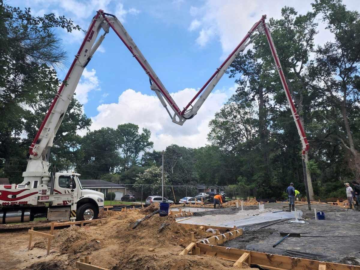 Concrete pump truck placing a residential pour