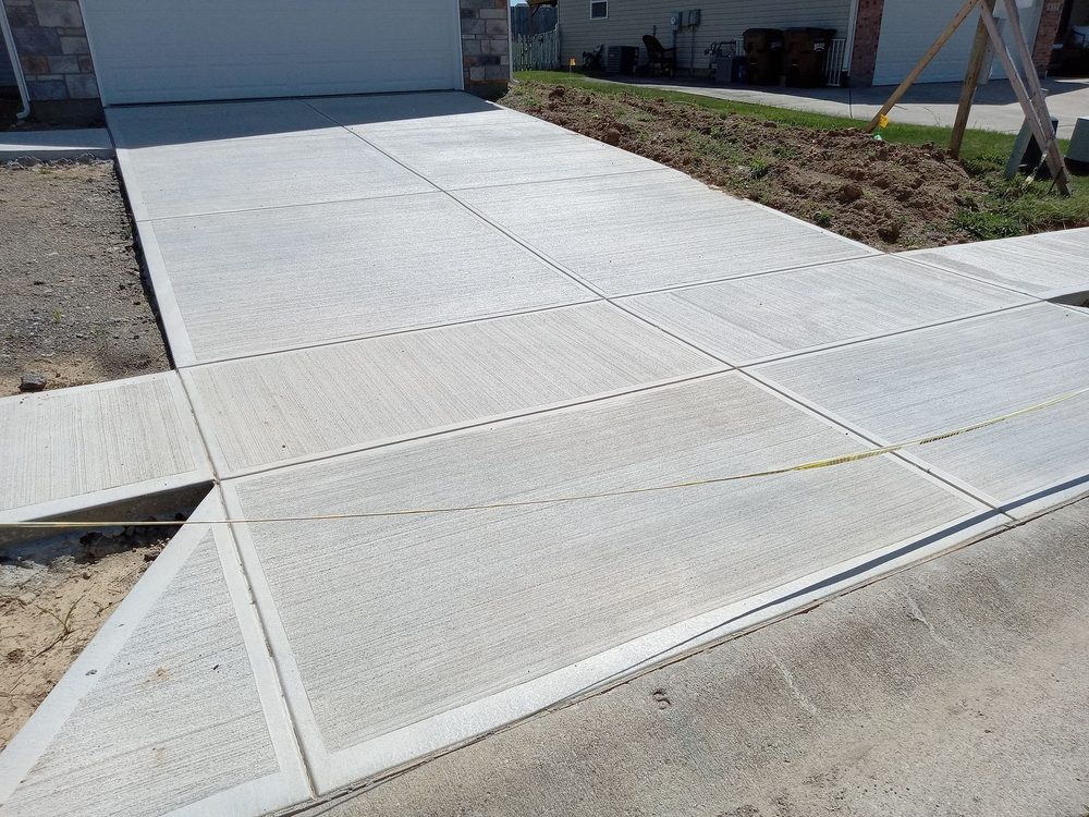 Freshly cut and finished concrete sidewalk