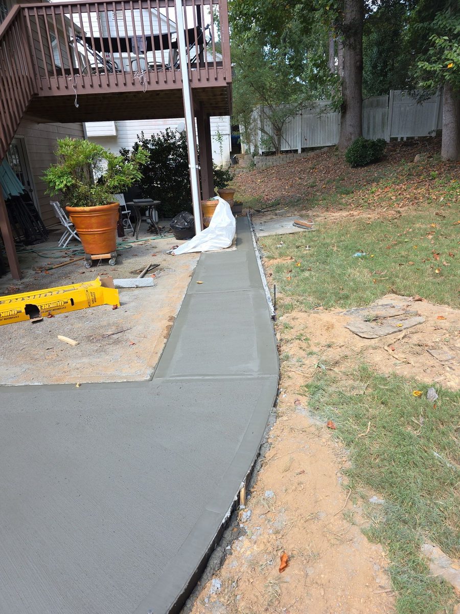 Curved walkway forms staked out before the pour