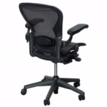 Aeron chair, side view with arms raised