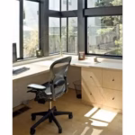 Aeron chair in a home office by a window
